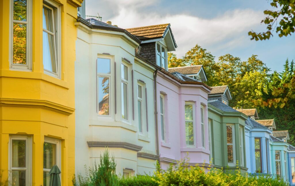 Glasgow Property, Colourful houses on leafy residential street