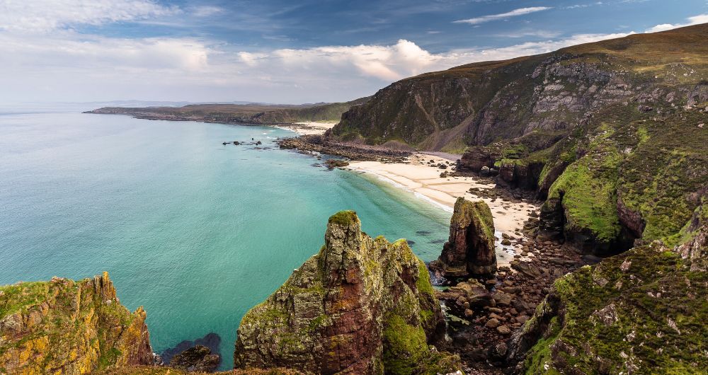 Dramatic cliffs and white sand beaches in Wester Ross