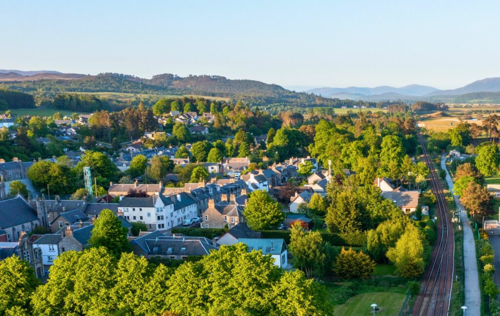 Rail Line in the Scottish Countryside Leaving Kingussie, Scotland