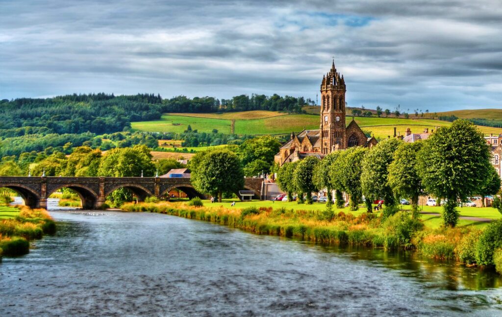 View of Peebles showing river and bridge